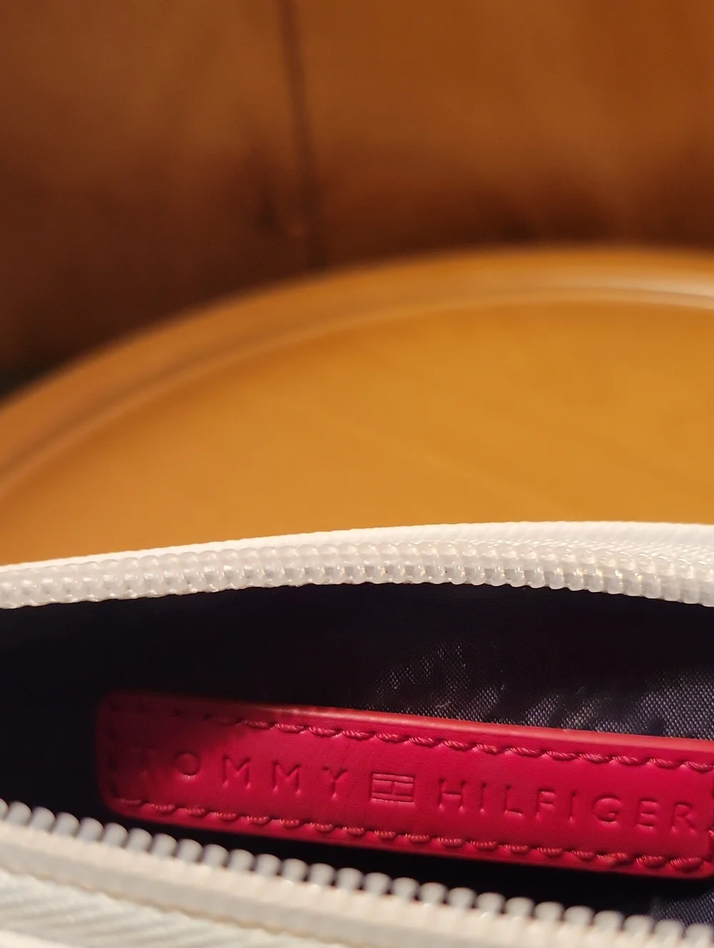 Tommy Hilfiger White Wristlet with Gold Plaque and Tan Strap